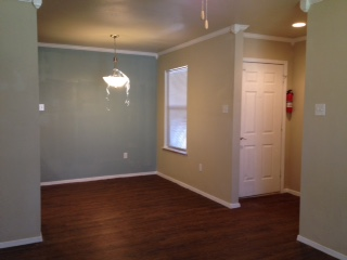 1 BR DR entry area with custom accent wall.JPG