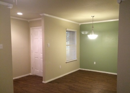 1 BR DR entry area with custom Sage accent wall.JPG
